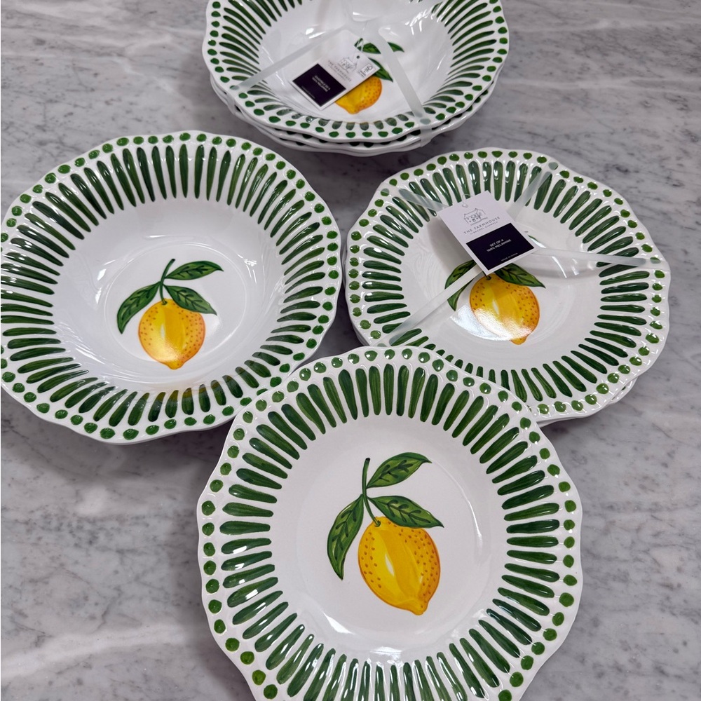 The farmhouse 100% melamine lemon green stripe set of 8 plates.